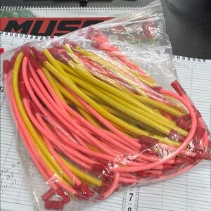 Pink and Yellow Diane loop rods for spiral perm